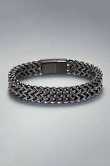 black link chain bracelet on white background