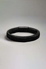 black leather bracelet for men on white background