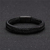 black bracelet on black surface