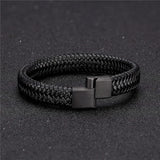 black bracelet on black surface