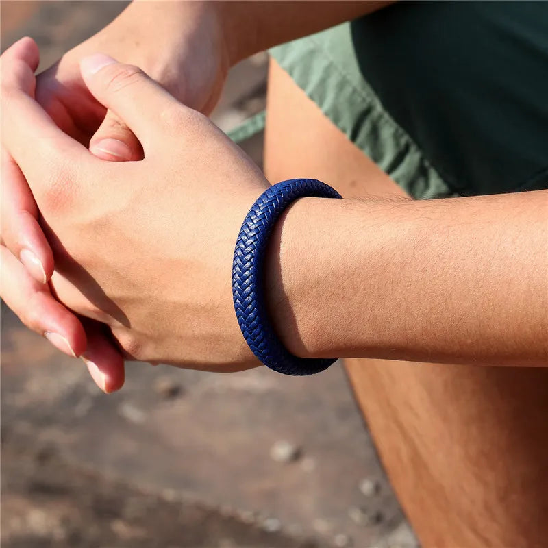 blue bracelet on hand