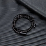 leather bracelet on black background