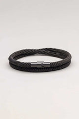 black rope bracelet for men on white background