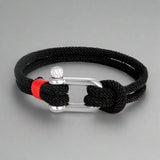 Black rope bracelet with subtle red detail and stainless steel clasp, ideal for everyday wear